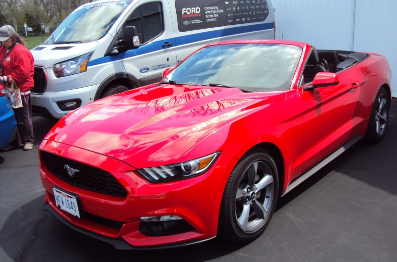 red mustang in the parking lot 