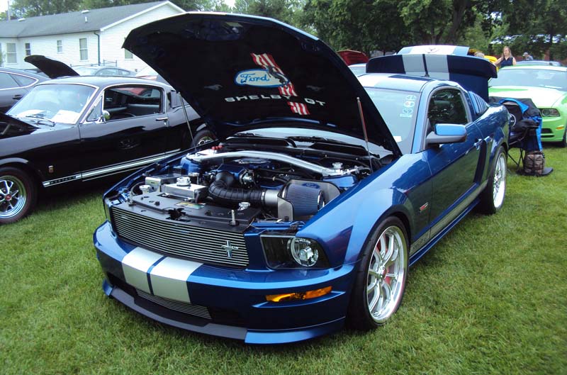 Blue Mustang with hood up