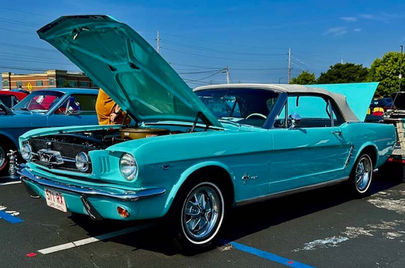 Neon blue mustang on display