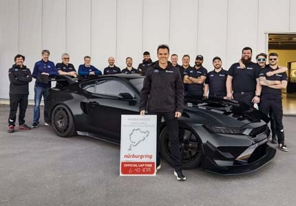 Team in front of Mustang GTD