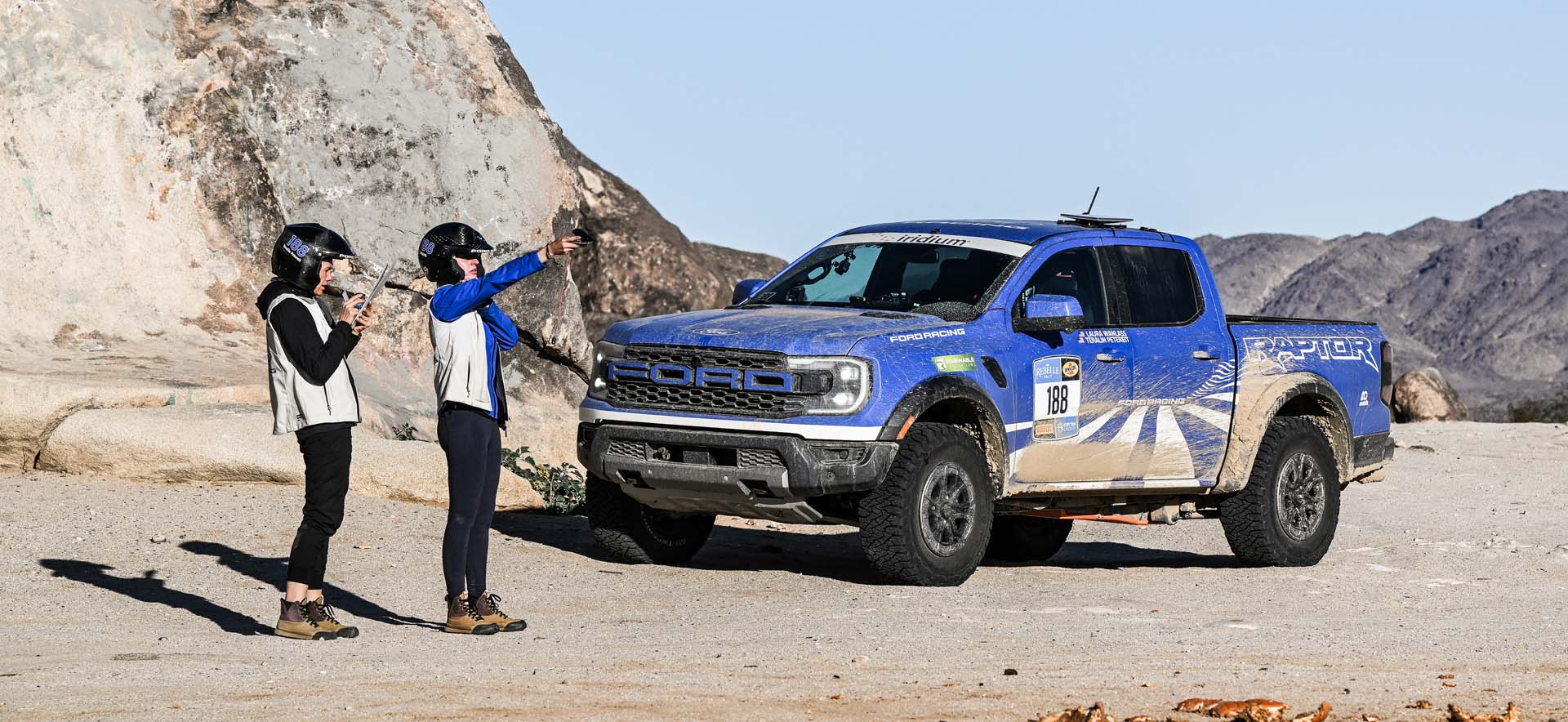 Rebelle team in desert next to ranger