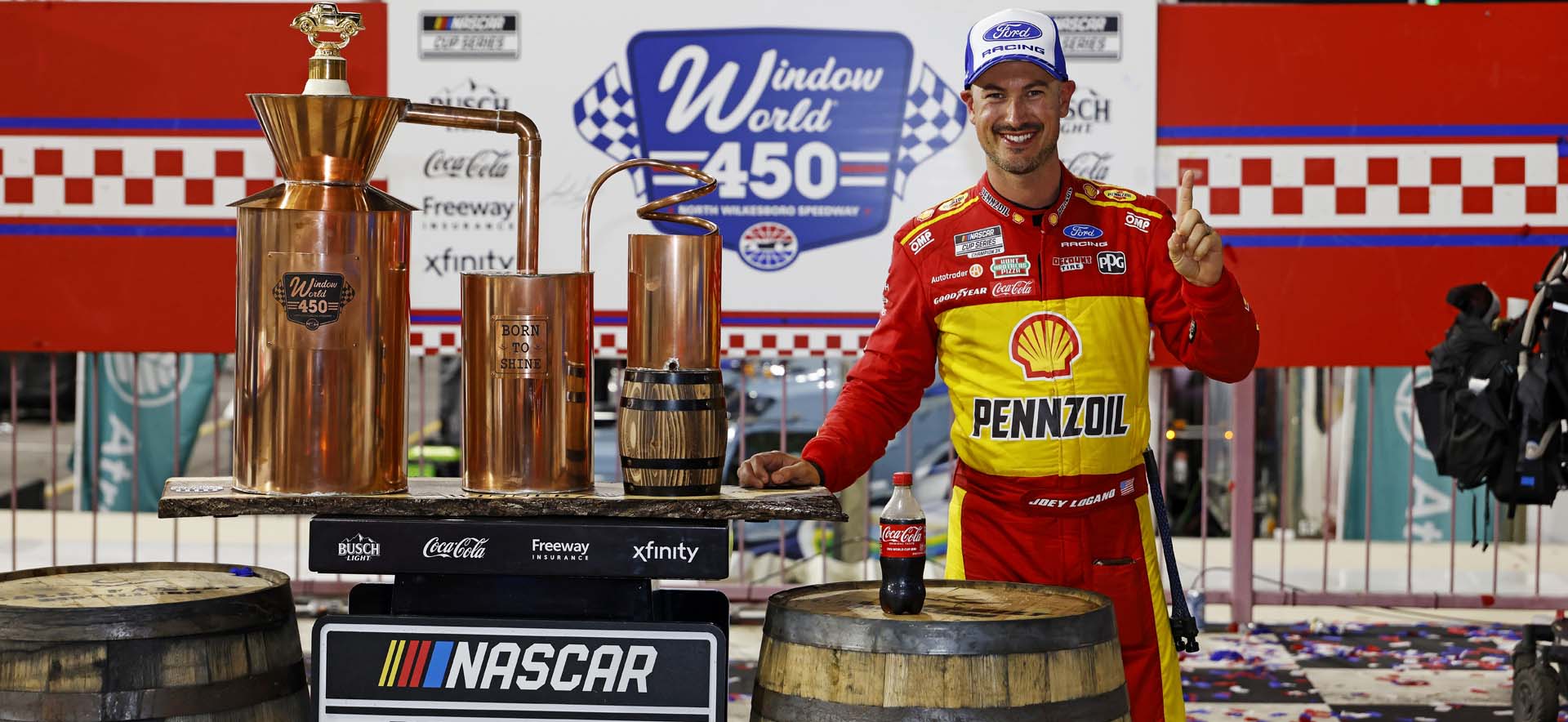 Logano in victory lane