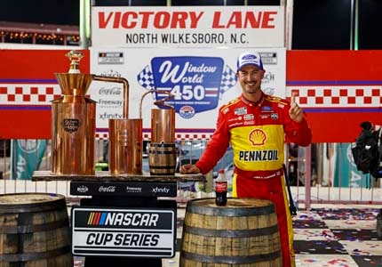 Logano in victory lane