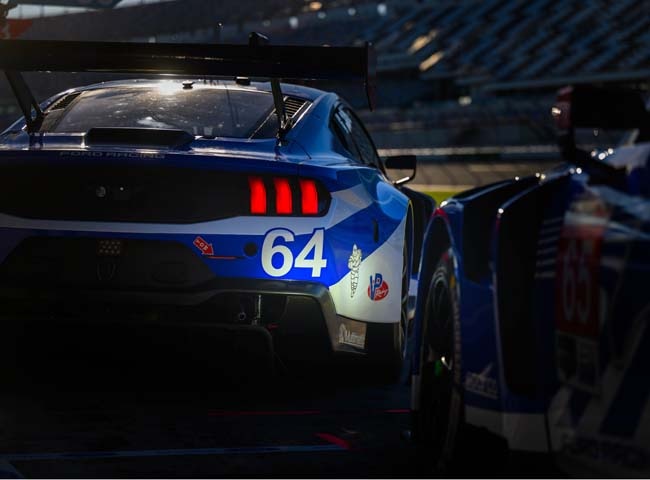 Race car from behind and in motion