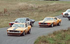 Ford Mustangs racing in 1970