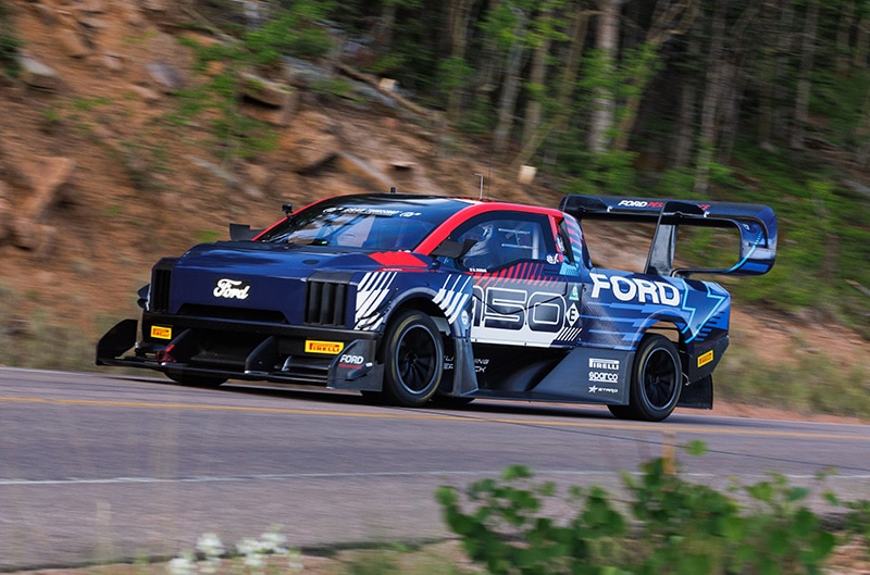 SuperTruck driving on mountain roads of Pikes Peak