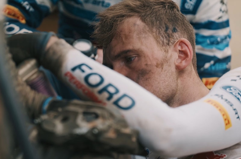 Driver in Ford gear