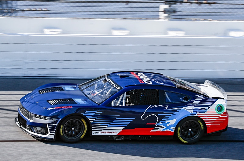 NASCAR Ford Mustang at speed on Daytona Speedway