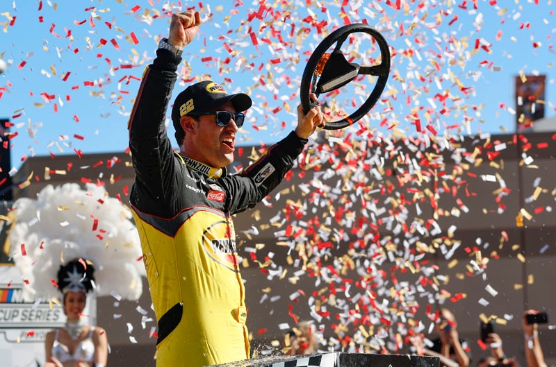 Logano celebrating at victory lane